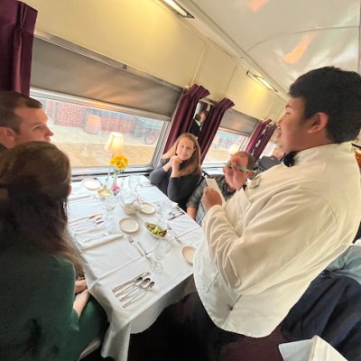 a group of people sitting at a table