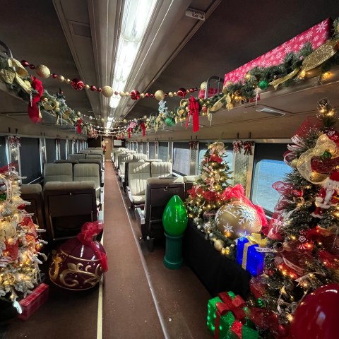 Christmas garlands and holiday decorations inside Santa’s Private Car.