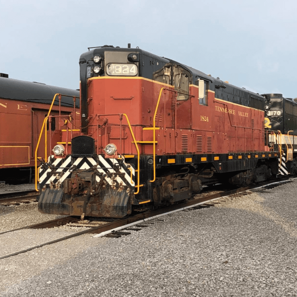 a large long train on a steel track