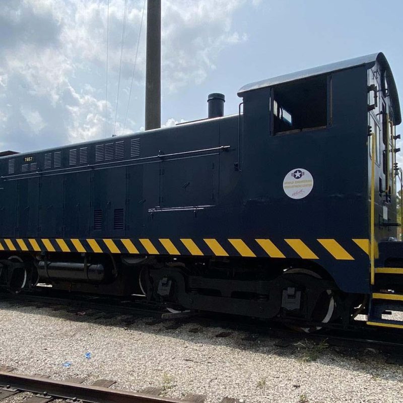 USAF 7467 ahead of its dedication sits at East Chattanooga in September of 2025, just behind steam locomotive 630.