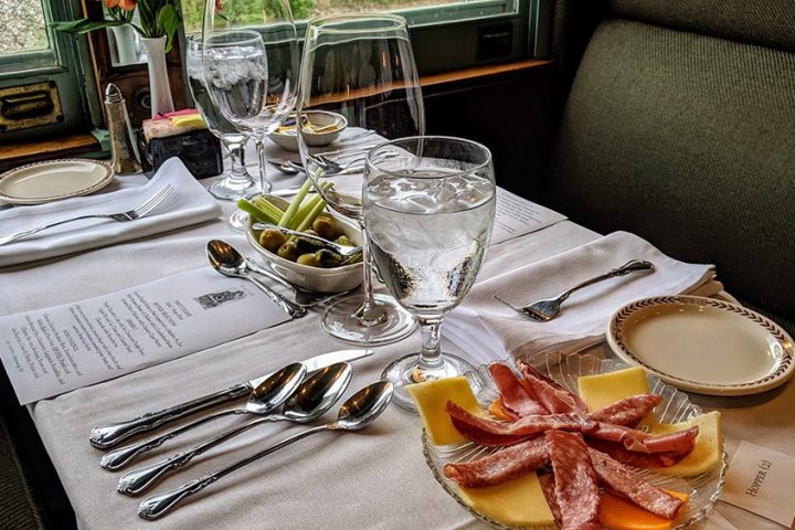 a table topped with plates of food on a plate