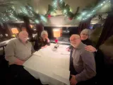 a group of people standing in a room