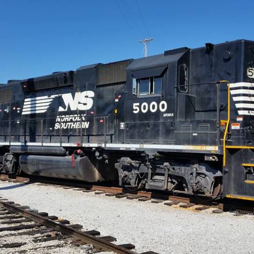 a truck that is sitting on a train track