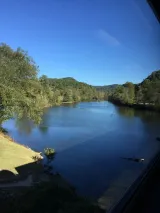 a view of a lake surrounded by a body of water