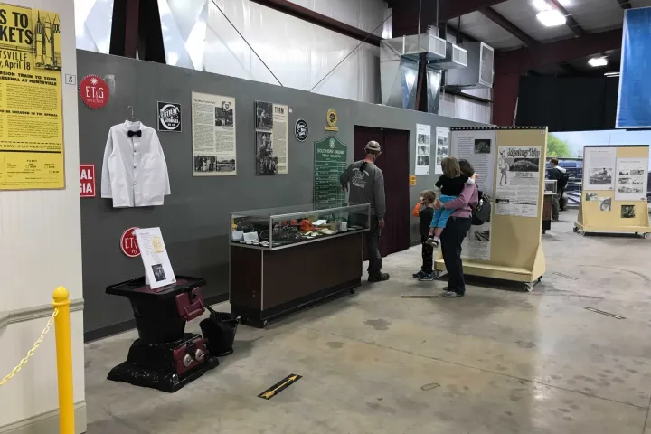 a group of people standing in a room