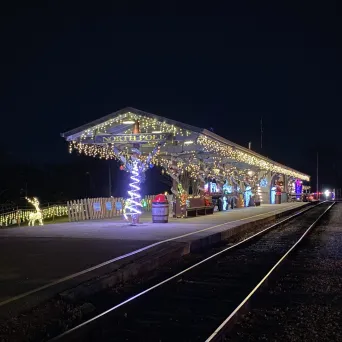 a train on the tracks at night