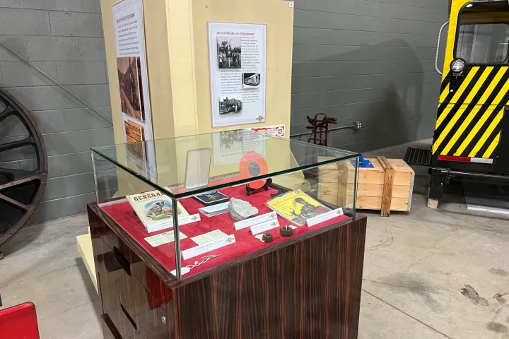 a box that has a sign on the side of a building