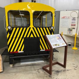 a school bus that is sitting on a bench