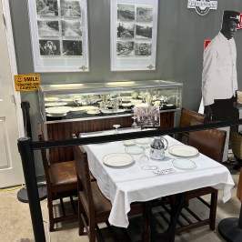 a kitchen with a table and chairs
