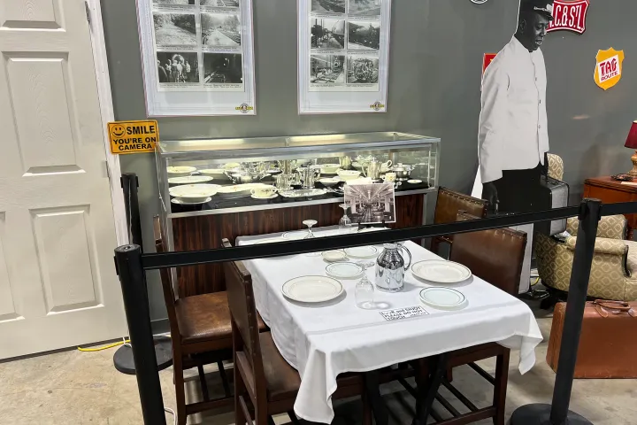 a kitchen with a table and chairs