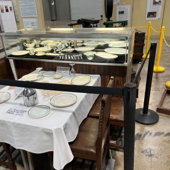 a group of men sitting at a table