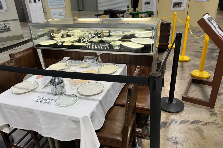 a group of men sitting at a table