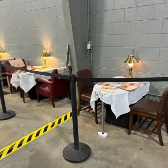a group of people sitting in chairs in a room