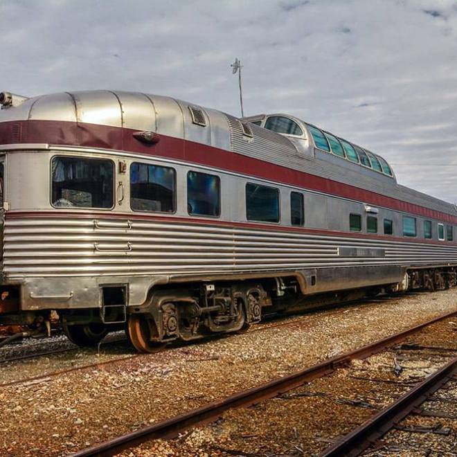 This car has been beautifully restored and offers a unique perspective for visitors. The large windows allow for beautiful views of the landscape as the train travels along the Hiwassee Loop and Copperhill.