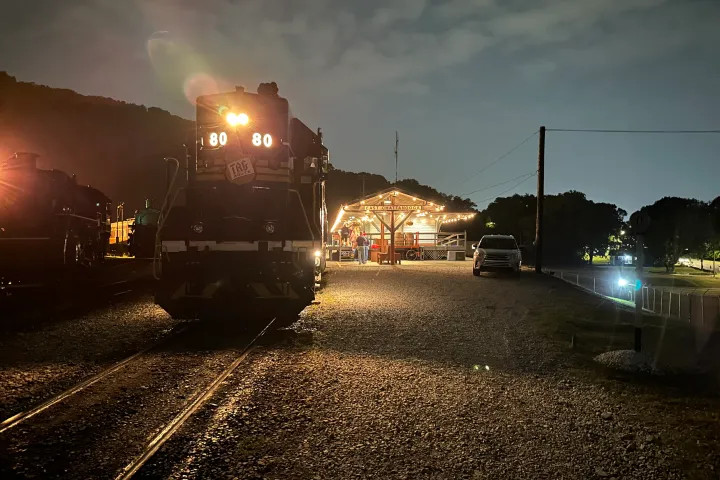 a train on the tracks at night