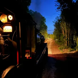 a clock on the side of the road