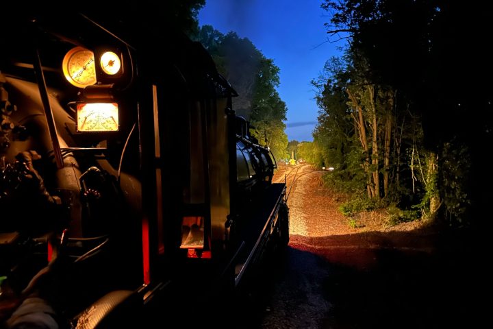 a clock on the side of the road