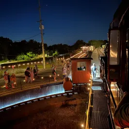 a group of people in a dark room