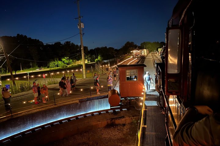 a group of people in a dark room
