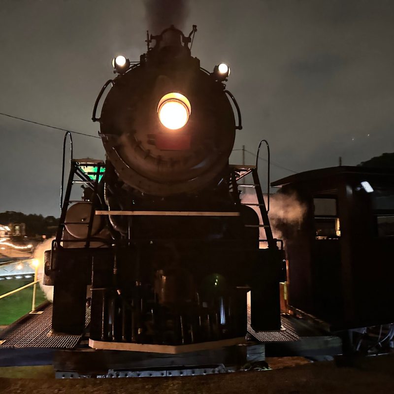 a train on the tracks at night