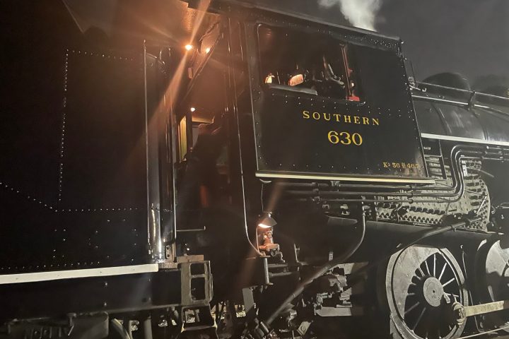 a man sitting on a stage