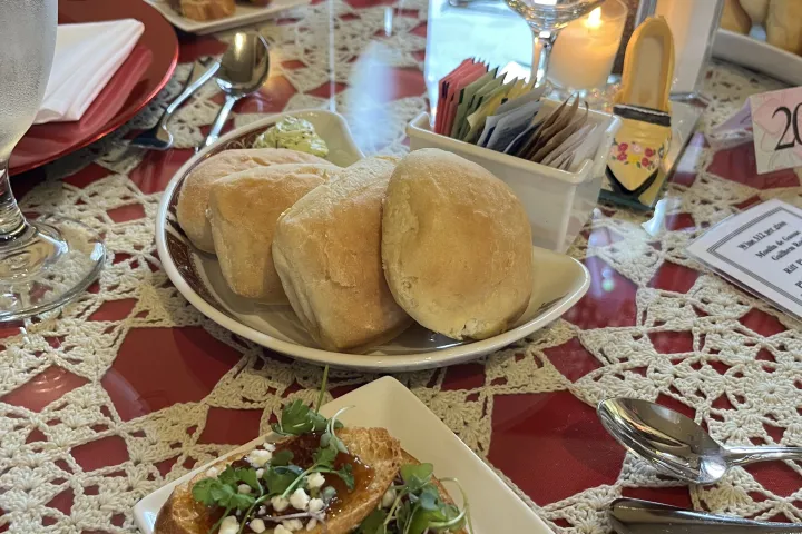 a table topped with plates of food on a plate