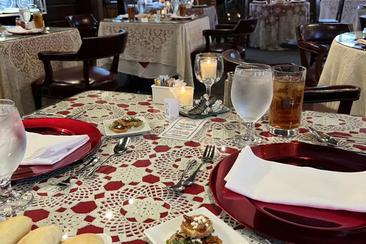 a table topped with plates of food on a plate