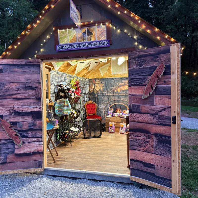 a sign in front of a building