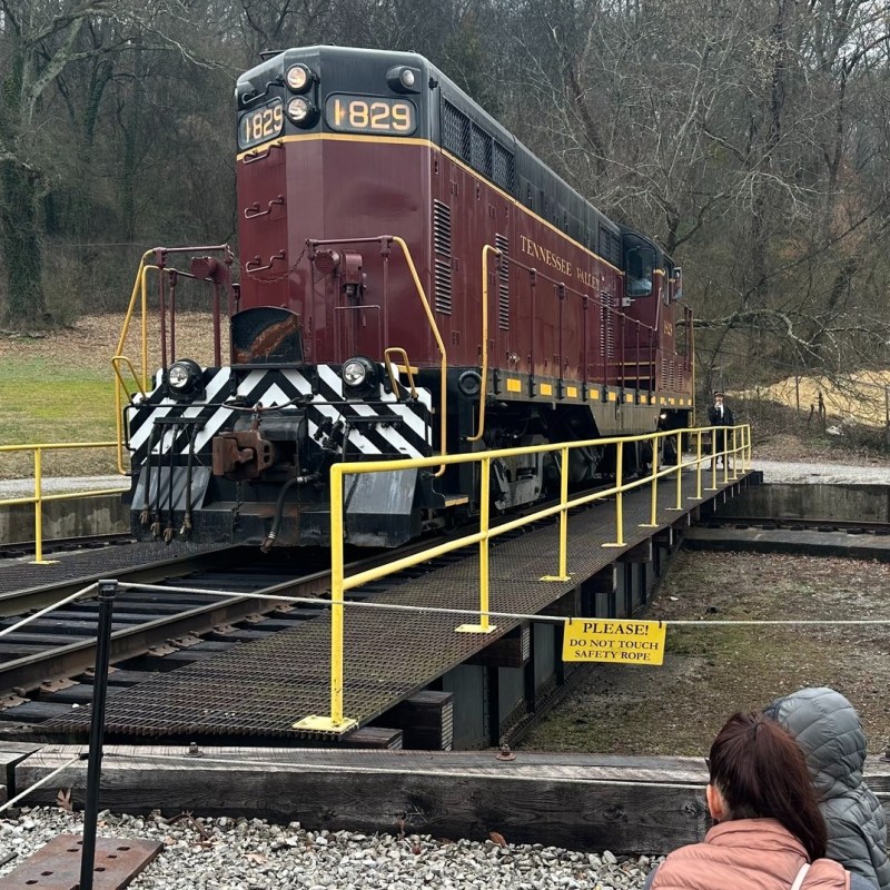 Tennessee Valley Railroad Engine 1829 on the turntable with a forested backdrop.