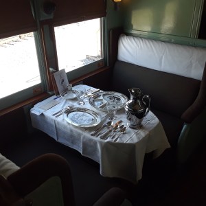 An open section aboard the heavyweight Pullman CLOVER COLONY set for meal service circa 1940-1950.