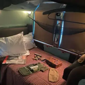 The lower berth in an open section aboard the Pullman CLOVER COLONY.