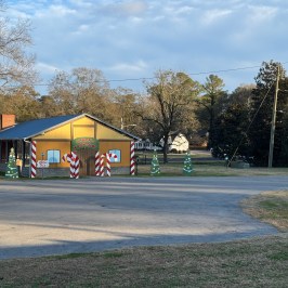 Summerville Depot decorated for the holiday season with Christmas lights and festive displays.