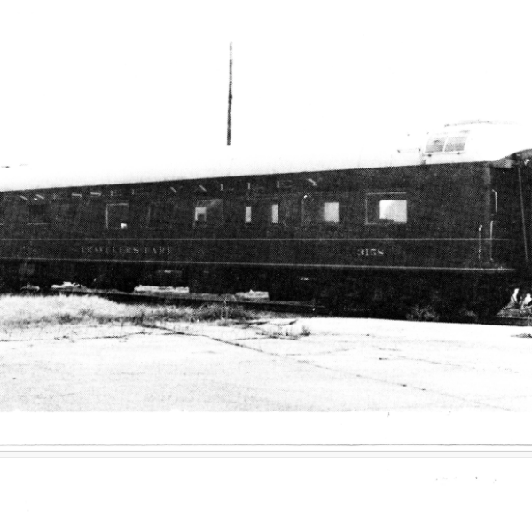 Historic black-and-white photo of a vintage railroad passenger car preserved by the Tennessee Valley Railroad Museum.