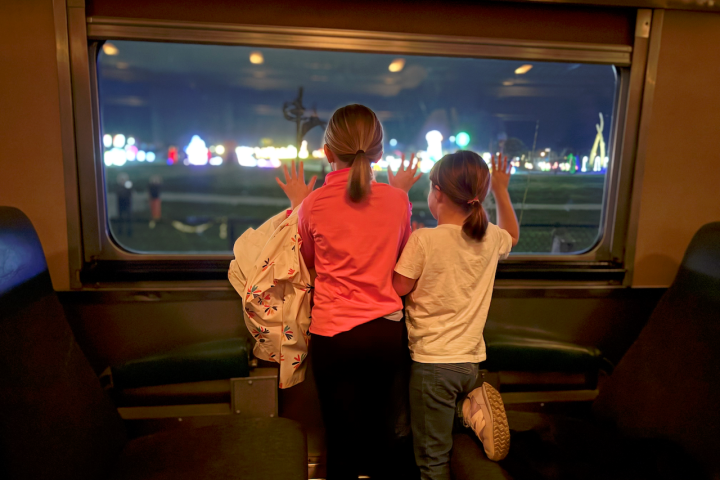 Guests posing for photos at illuminated lantern displays during the SeaLight Festival in Chattanooga