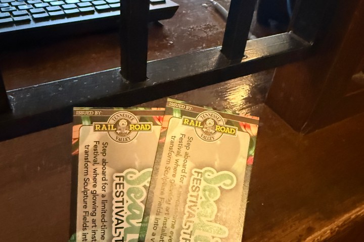 SeaLight Festival train tickets on a table inside a Tennessee Valley Railroad Museum passenger car